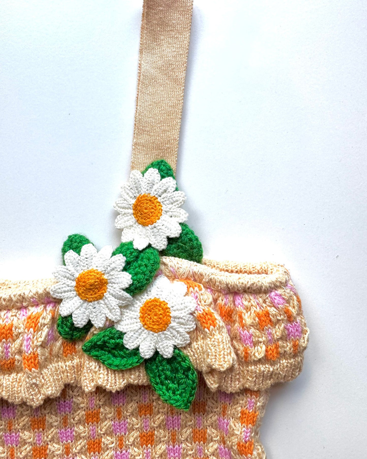 Knitted frill hem cropped square neck top with daisy crochet flower