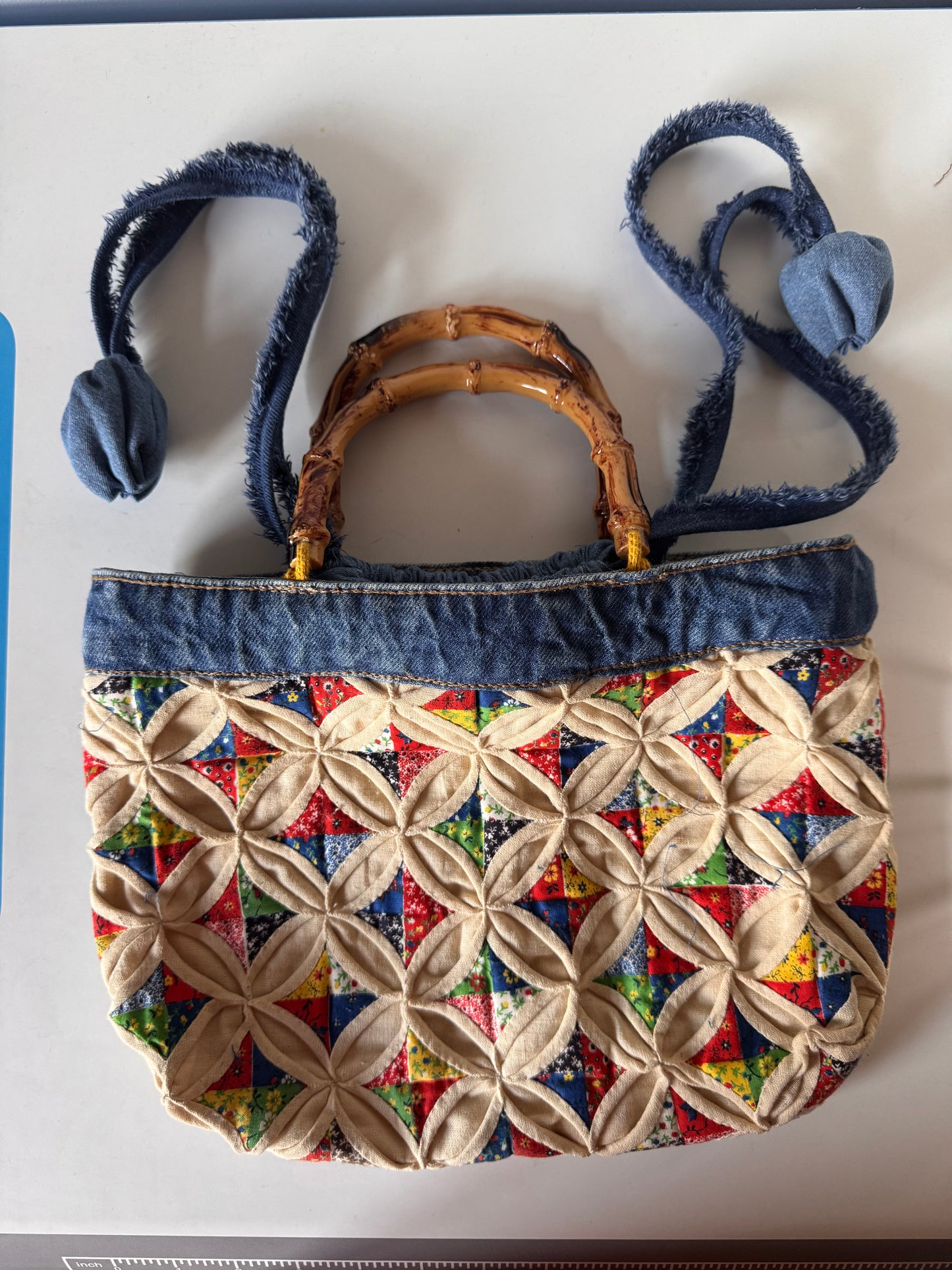 Quilted tote bag with Bamboo cane curved handles and drawstring