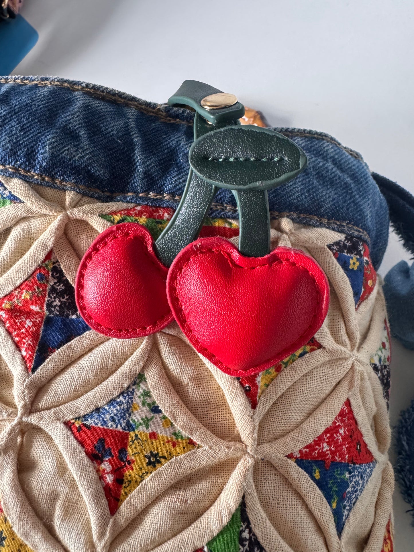 Quilted tote bag with Bamboo cane curved handles and drawstring