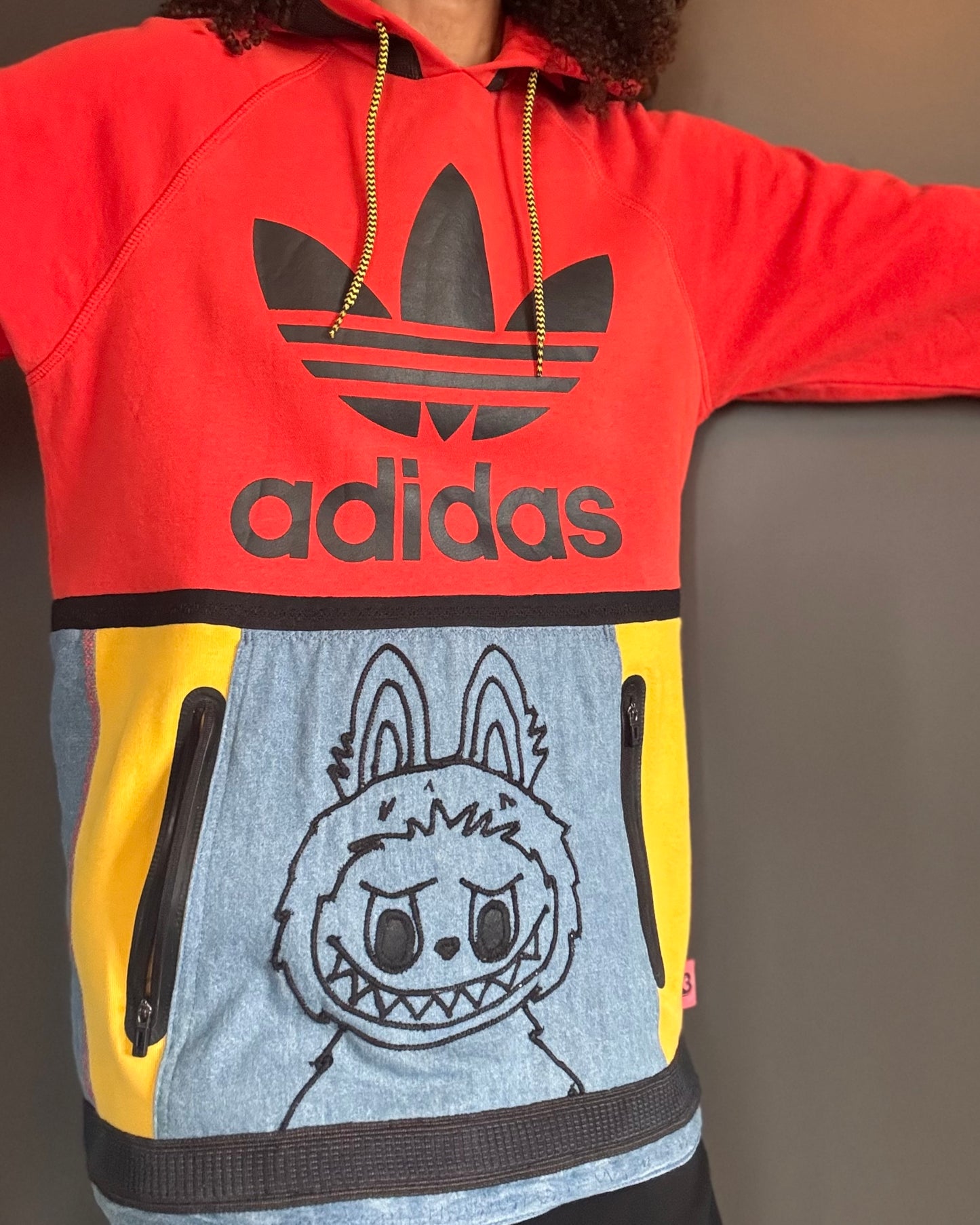 Labubu hoodie with embroidered Labubu, Adidas hybrid.