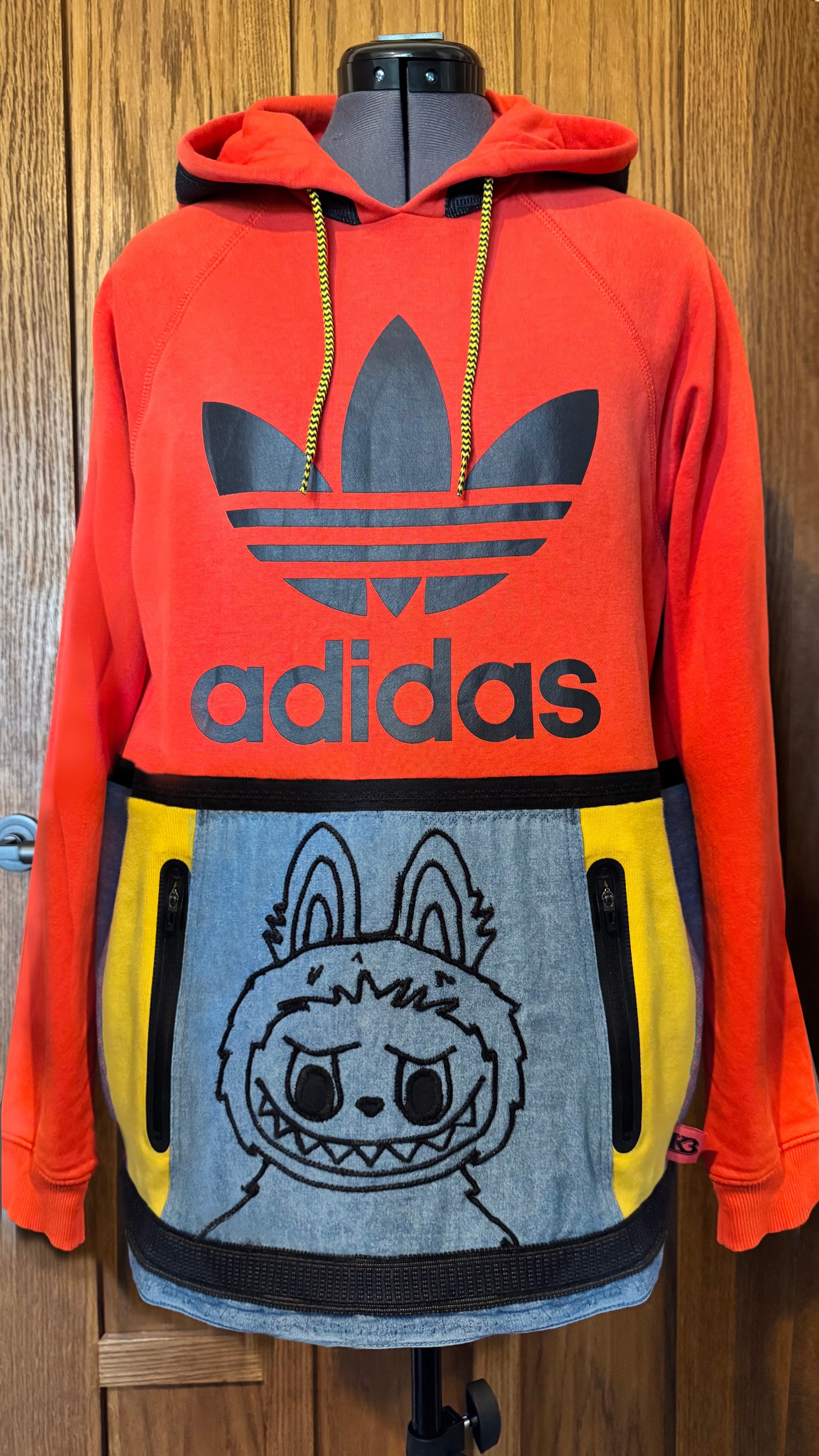 Labubu hoodie with embroidered Labubu, Adidas hybrid.