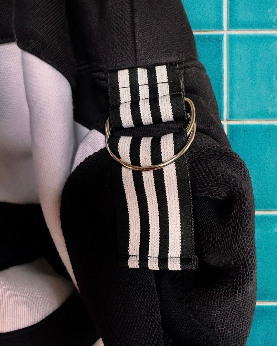 Mono Adidas hoodie and layered skirt.