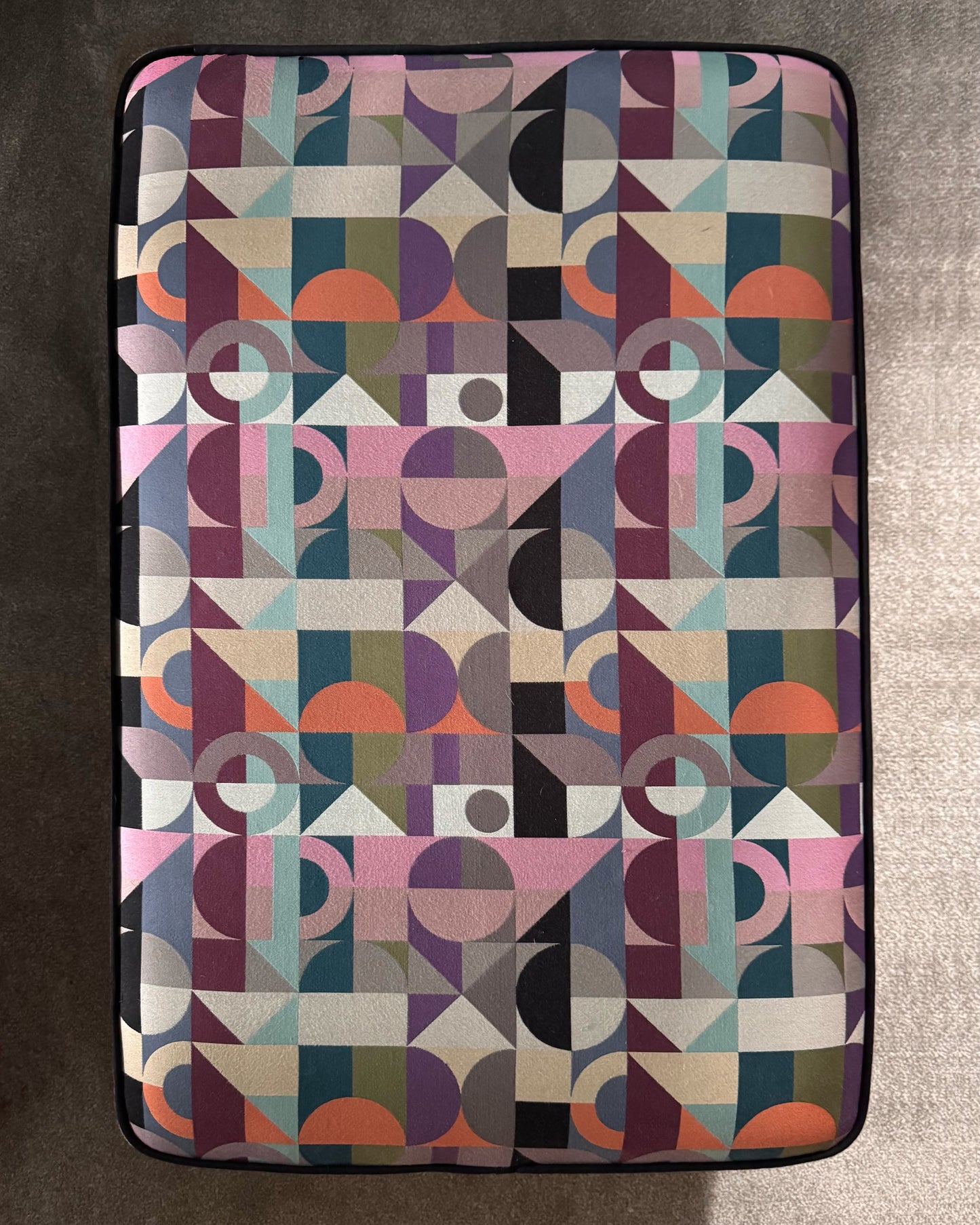 Footstool covered in Osbourne and Little-Motown