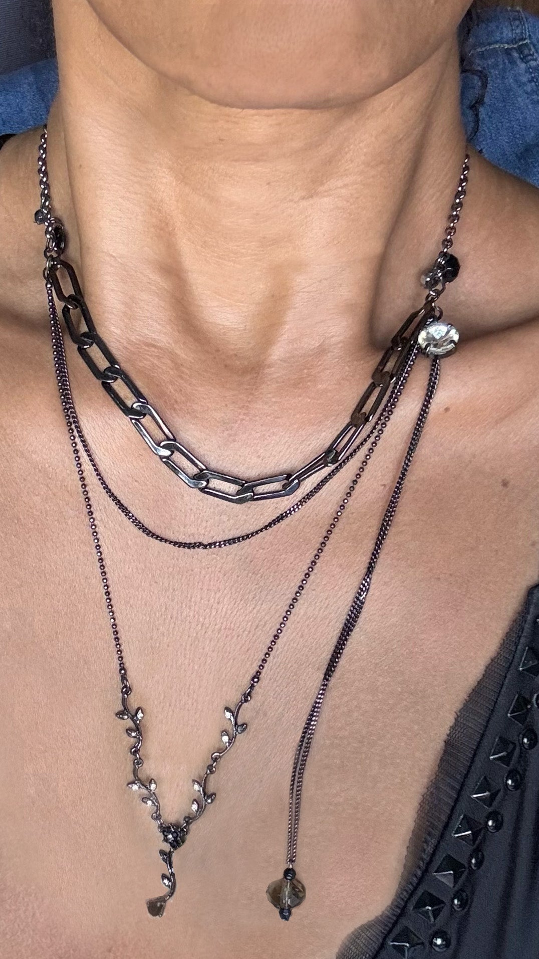Black multi chain drop necklace with gems