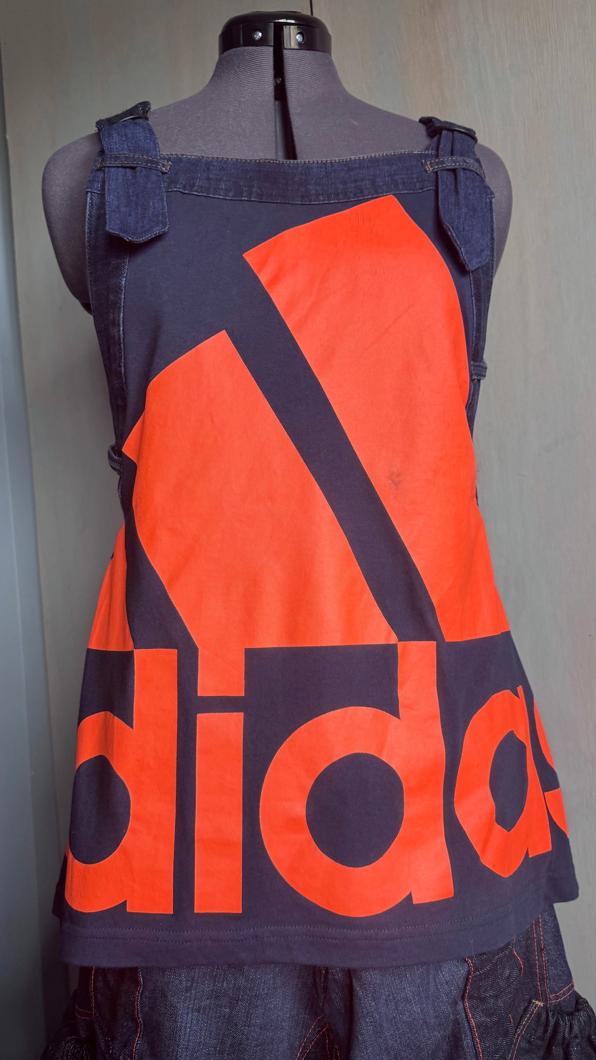 A one-of-a-kind reworked Adidas denim pinafore dress, created from qua – Kind Beginning